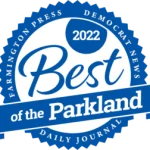 A blue and white circular badge reads “2022 Best of the Parkland” with “Farmington Press,” “Democrat News,” and “Daily Journal” around the border.
