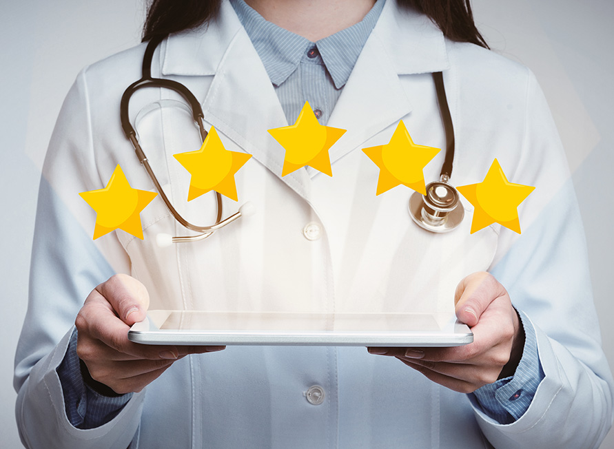 Female doctor holding a tablet displaying five-star reviews.
